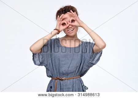 Girl Holding Fingers Near Eyes Like Glasses:. Mask Like Super Hero Or Owl.