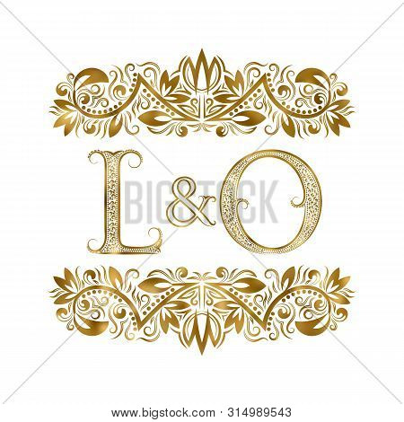 L And O Vintage Initials Logo Symbol. The Letters Are Surrounded By Ornamental Elements. Wedding Or 
