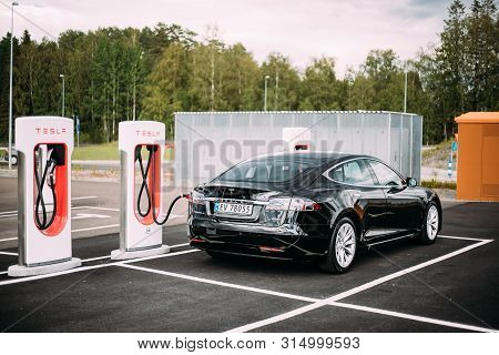 Tocksfors, Sweden- June 26, 2019: Black Color Tesla Model S 100d Car Parked At Charging Station. The