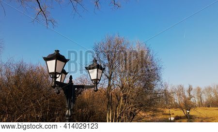 Vintage Lantern In The Spring City Park. Filmed At The Level Of The Head Of The Lantern.