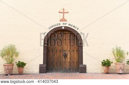 SOLVANG, CALIFORNIA - SEPTEMBER 21, 2016: Mission Santa Ines door closeup. Founded on September 17, 1804,  today it serves as a museum as well as a parish church of the Archdiocese of Los Angeles.