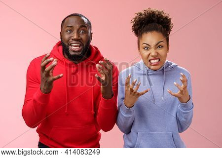 Two Siblings Upset Failure Losing Bet Watching Football Match Cringing Sorrow Reckless, Raising Hand