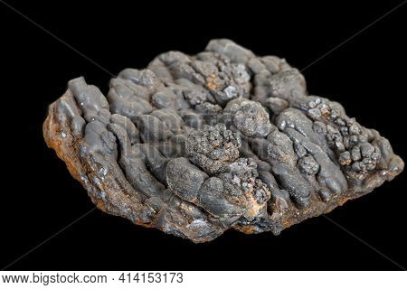 Macro Of The Stone Hematite Mineral On A Black Background Close Up