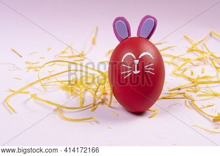 Egg With Easter Rabbit Drawn On Pink Background