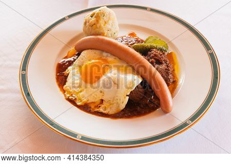 Fiakergulasch Or Herrengulasch Viennese Beef Goulash Garnished With A Bread Dumpling, Frankfurt Saus