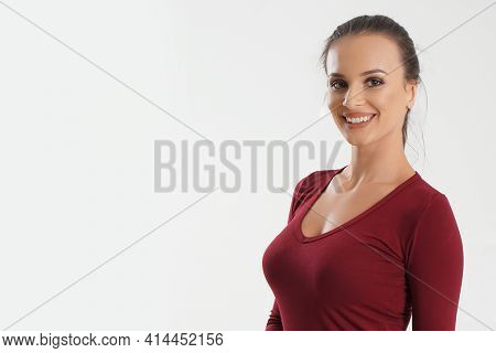 Portrait Of Young Beautiful Cute Cheerful Girl Smiling Looking At Camera Over White Background. Woma