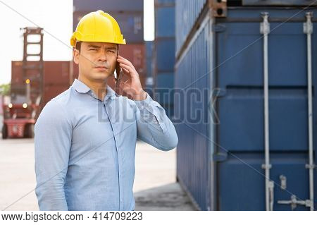 Caucasian Men Freight Supervisor Inspect The Condition Of All Containers Shipment By Using Tablet To