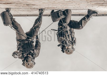 Two Commandos Train At The Base. Climbers. Swat, Police, Counterterrorism Concept. Mixed Media