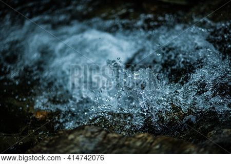 Splashing Water In A Mountain River On Rafting
