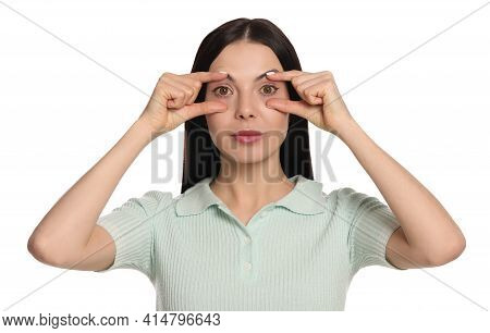 Woman Checking Her Health Condition On White Background. Yellow Eyes As Symptom Of Problems With Liv