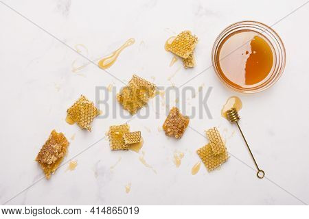 Glass Jar Full Honey With Honey Spoon. High Quality And Resolution Beautiful Photo Concept