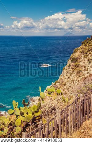 Rock cliff of cape Capo Vaticano with Aeolian Islands, Tyrrhenian Sea, Calabria, Southern Italy