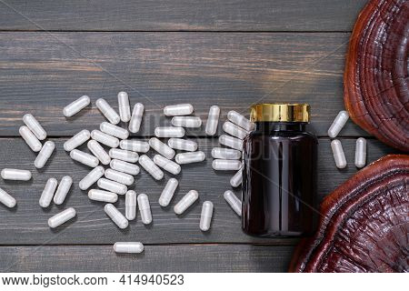 Ling Zhi Mushroom And Capsule With Bottle Mockup