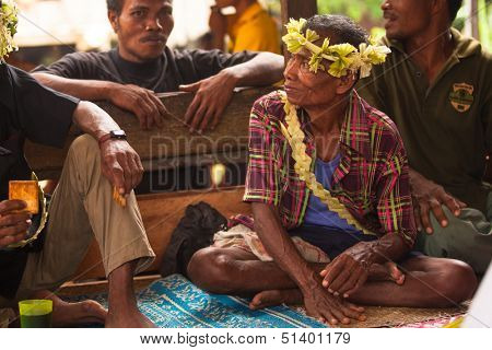 BERDUT, MALAYSIA - APR 8: Unidentified man Orang Asli in his village on Apr 8, 2013 in Berdut, Malaysia. More than 76% of all Orang Asli live below the poverty line, life expectancy - 53 years old.