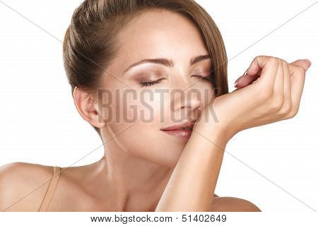 Beautiful Brunette Female Model Smelling Her Perfume
