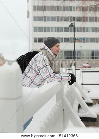 Tourist in winter clothes in Oulu, Finland