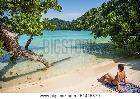 Beautiful Young Female Model Meditating And Relaxing, Looking At Turquoise Sea At Surin Tropical Isl