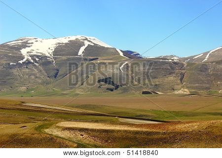 Mountain landscape with Italy symbol