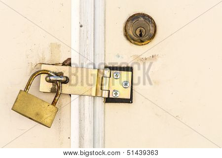 Old Key Lock On White Door