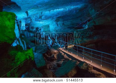 Sataplia cave in Georgia lit by different colors