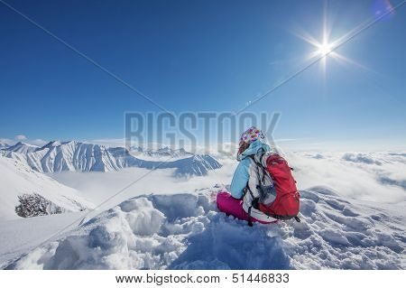 Hiker in winter Caucasus mountains in Georgia Gudauri