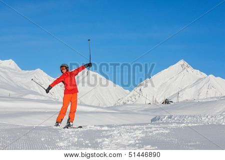 Skier is posing at camera at Gudauri resort in high mountaing of Georgia Caucasus