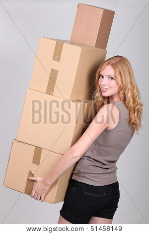 young woman holding cardboxes