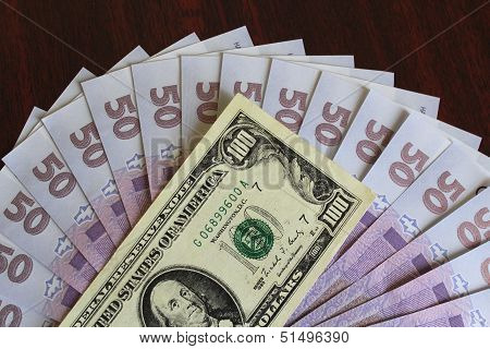 dollars and grivnas banknotes