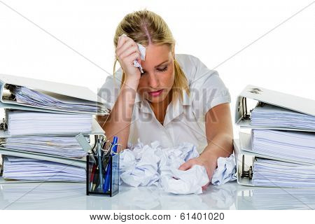 young woman in office is overwhelmed with work. burnout in work or study.