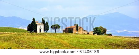 Rural Tuscan church and house