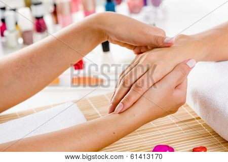 Close up of process of hand massage at beauty salon