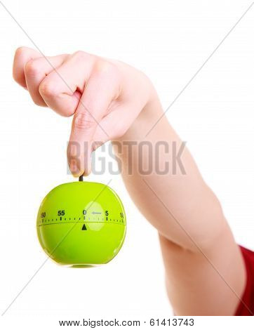 Closeup Housewife Or Chef In Kitchen Apron Showing Apple Timer