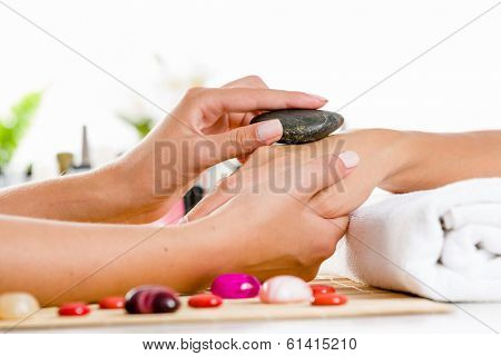 Close up of process of hand massage at beauty salon