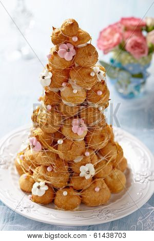 Croquembouche with Pink and White Frosting Roses