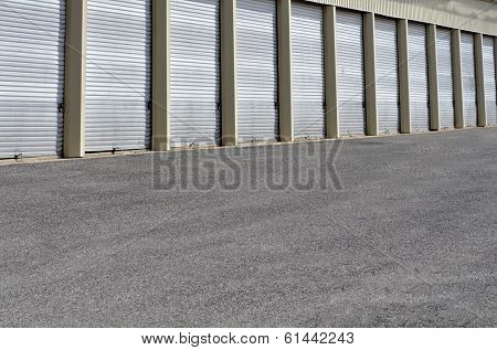 Detail of storage units building with sliding garage style doors