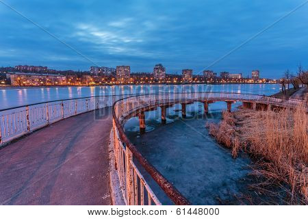 Evening shot of promenade on the river Kalmius