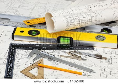 construction drafts and tools on the table