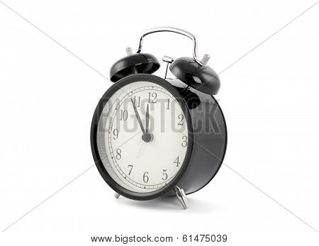 Black old style alarm clock with clipping path