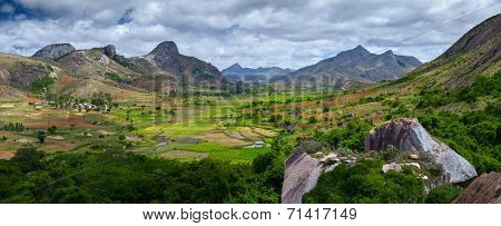 Green valley with rice fields and villages among mountains. Anja reserve, Madagascar