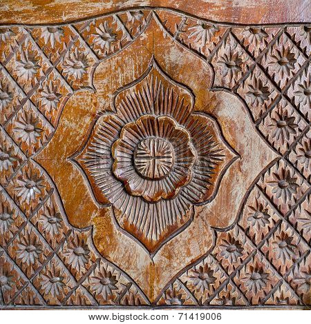 Pattern Of Flower Carved On Wood Background