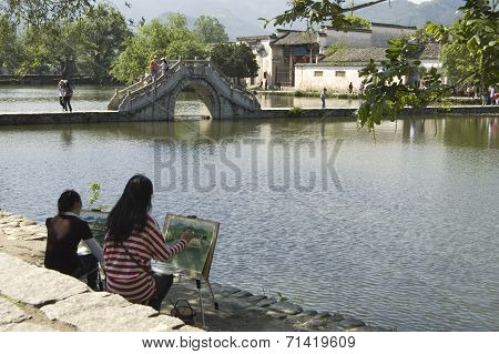 Hongcun Bridge And Artists
