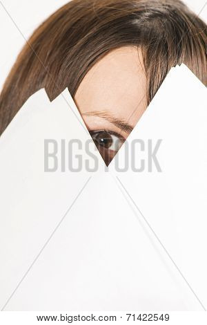 Woman looking through shets of papers