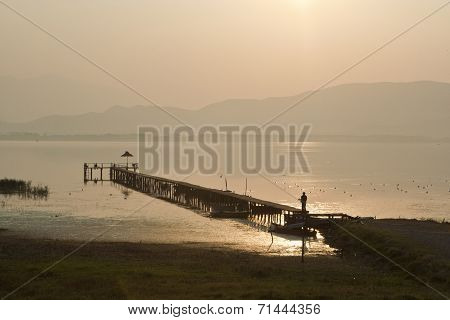 Old Wooden Dock On Dojran Lake At Sunset, Republic Of Macedonia