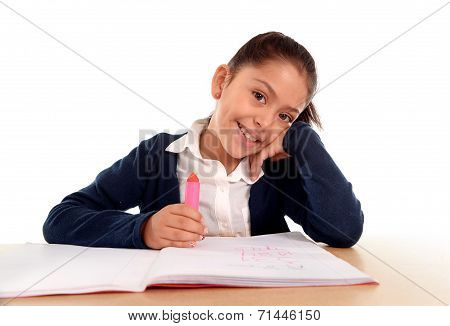 Happy Latin Little Girl With Notepad Smiling In Back To School And Education Concept