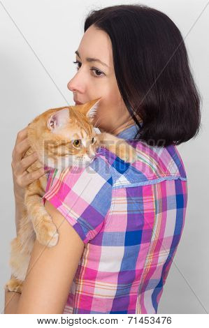A Woman With A Cat On His Shoulder