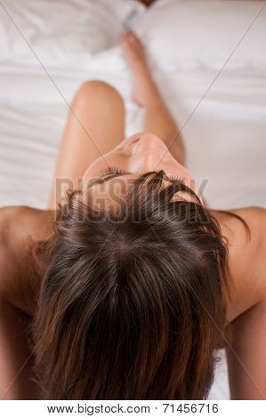 Young Woman In Bed
