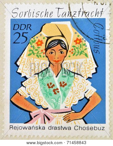EAST GERMANY- CIRCA 1971: stamp printed in Germany shows Dance Costume circa 1971.