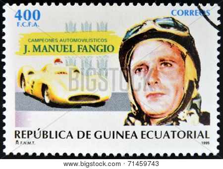 stamp printed in Guinea dedicated to car champions shows Juan Manuel Fangio