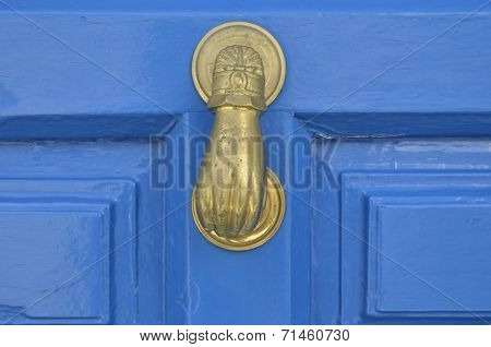 Old metal door handle knocker