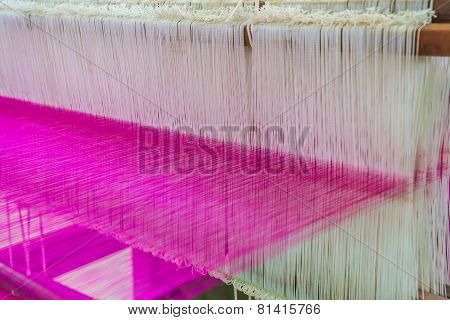 Weaving Loom And Shuttle On The Warp